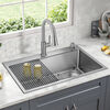 Lavabo de cocina tipo estación de trabajo con un receptáculo de acero inoxidable de 33" de montaje bajo encimera encastrado, con reborde WorkFlow™ y accesorios